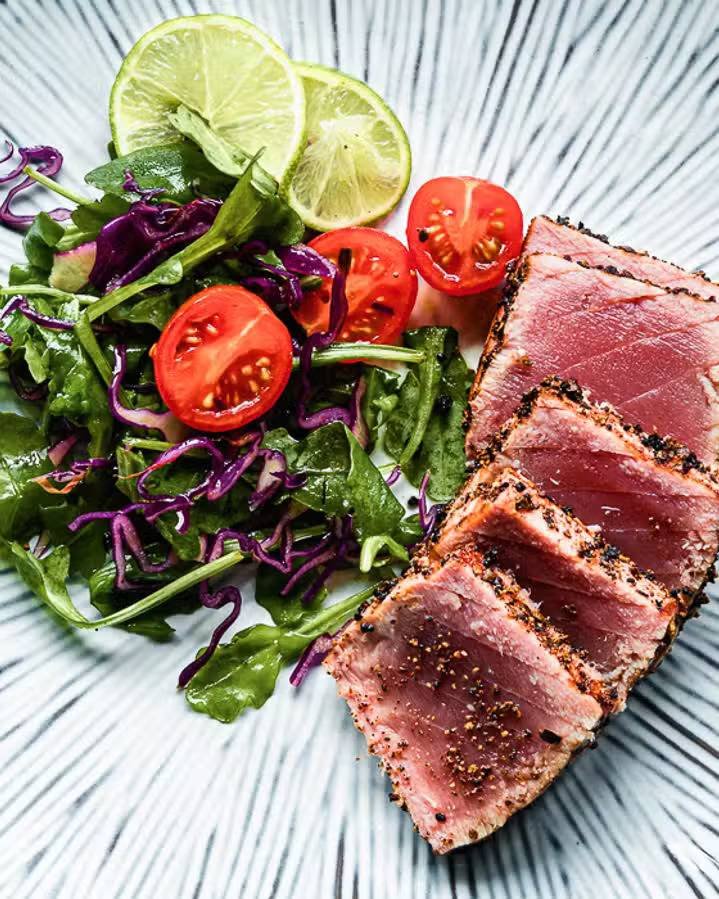 Seared peppered tuna with a crisp salad